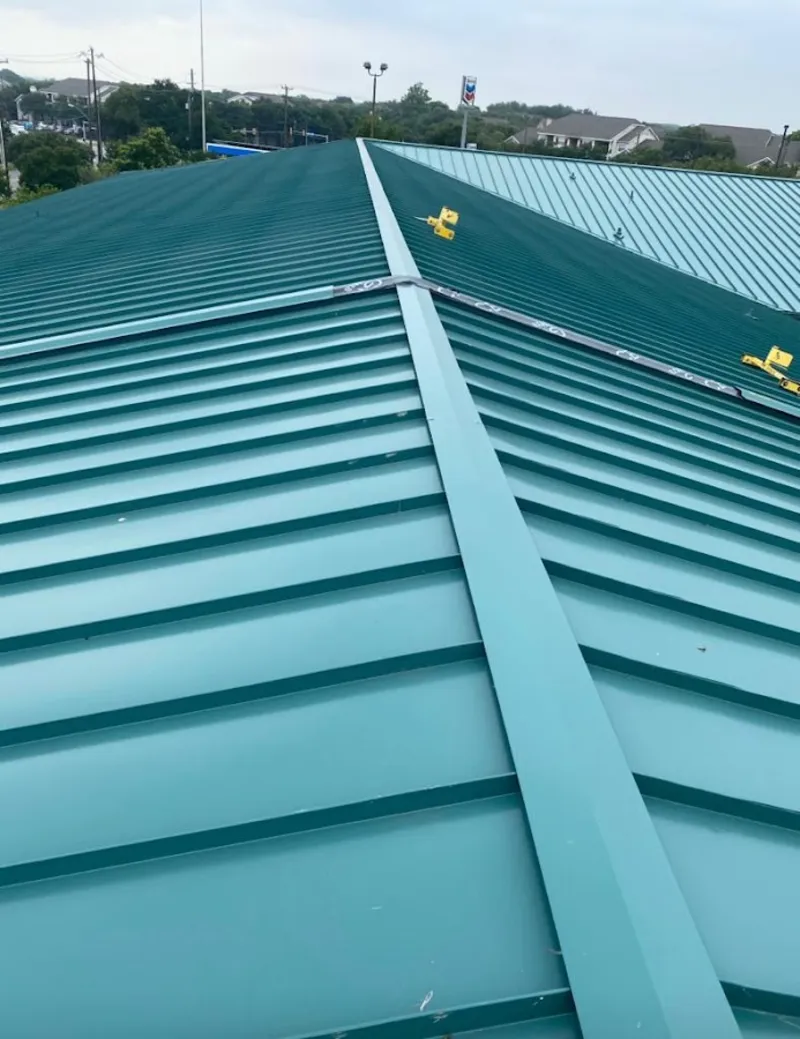 Green commercial metal roof ridge and valley for Metal Roof Repair in West Boylston